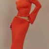 Ainsley Asymmetrical Long Sleeve Top With Floral Hardware – Burnt Orange