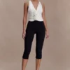 Alessandra Slinky Ruffle Top – Ivory